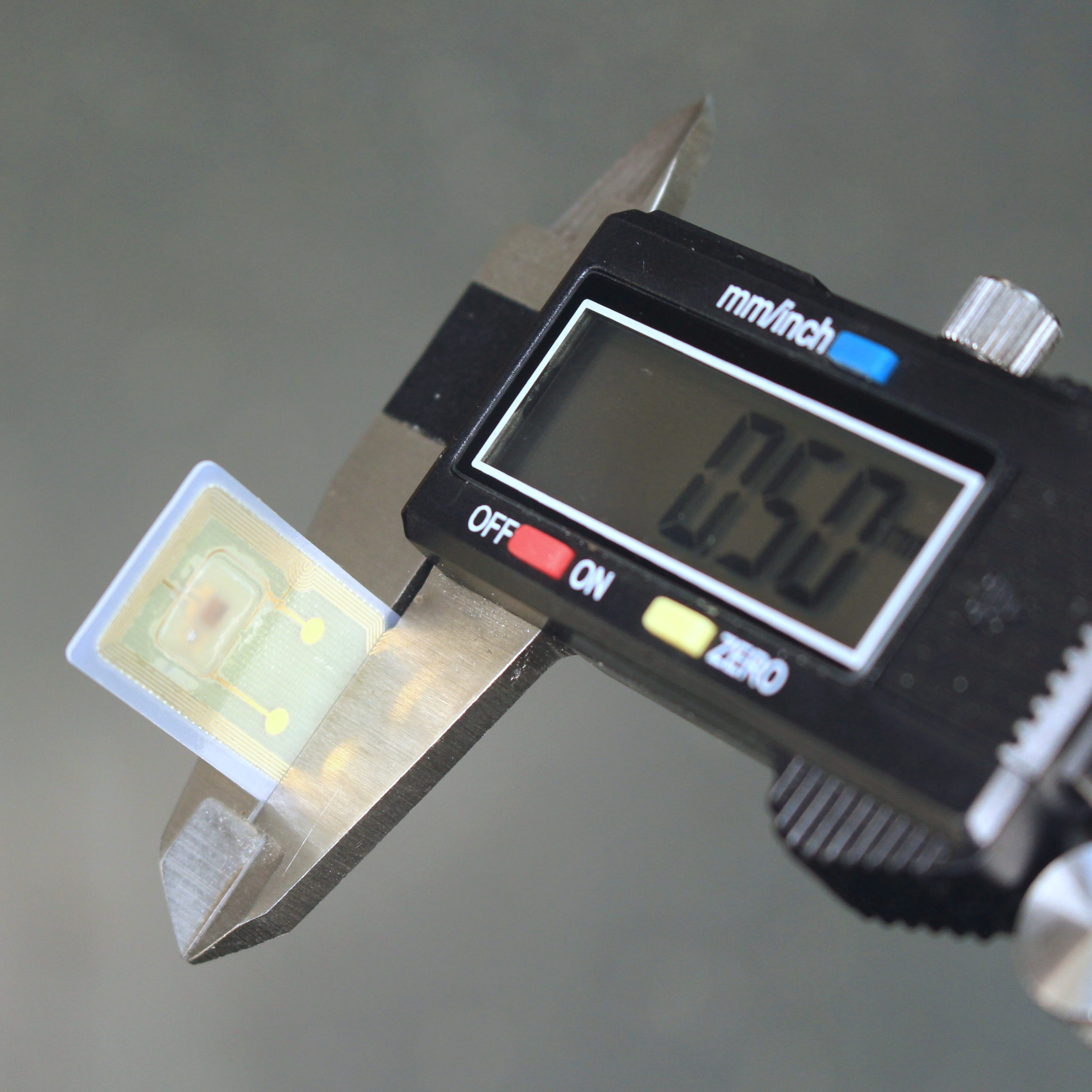 Converted payment micro-card implant in calipers